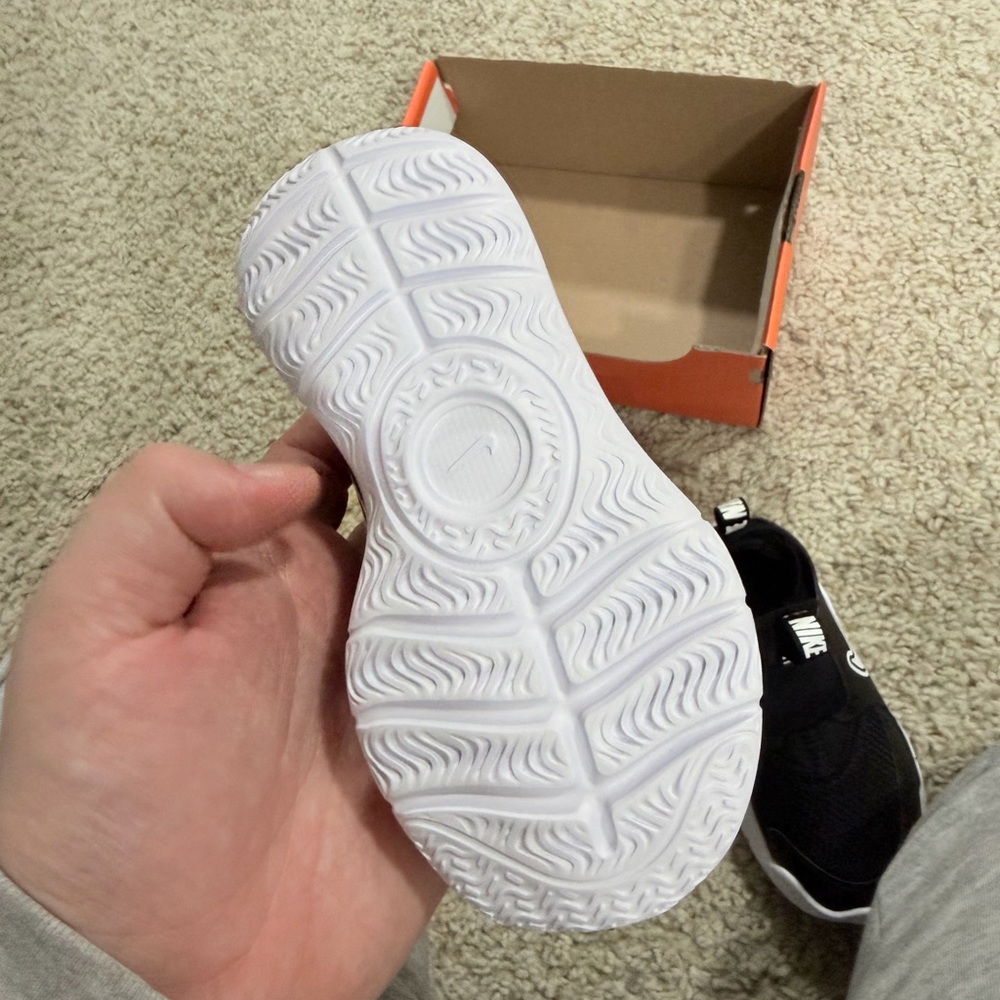 Nike Kids Black and White Slip-On Sneaker with Bold Swoosh - Picture 4 of 6